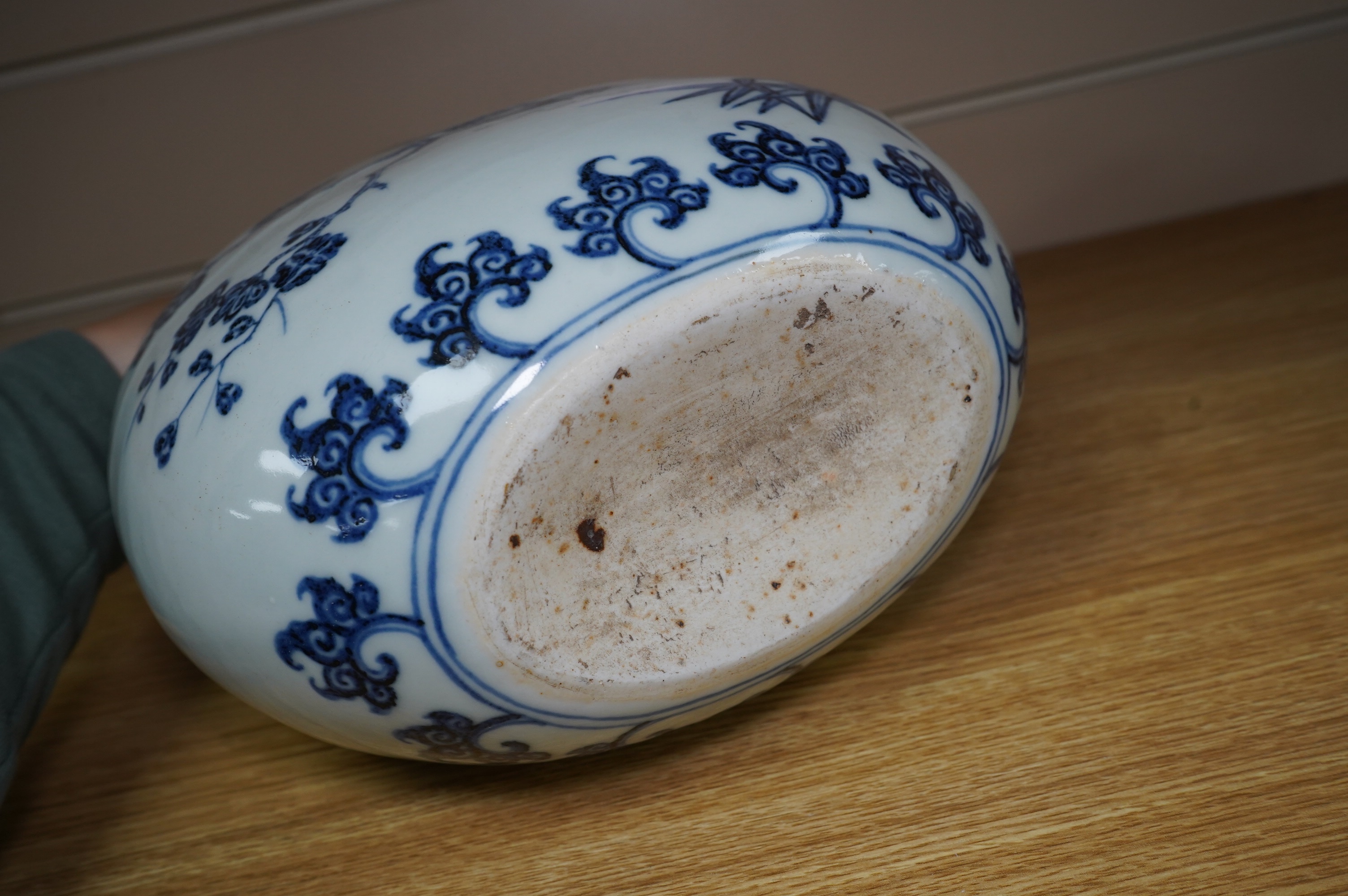 A Chinese blue and white two handled moon flask, decorated with birds on on branches, 29cm high. Condition - good